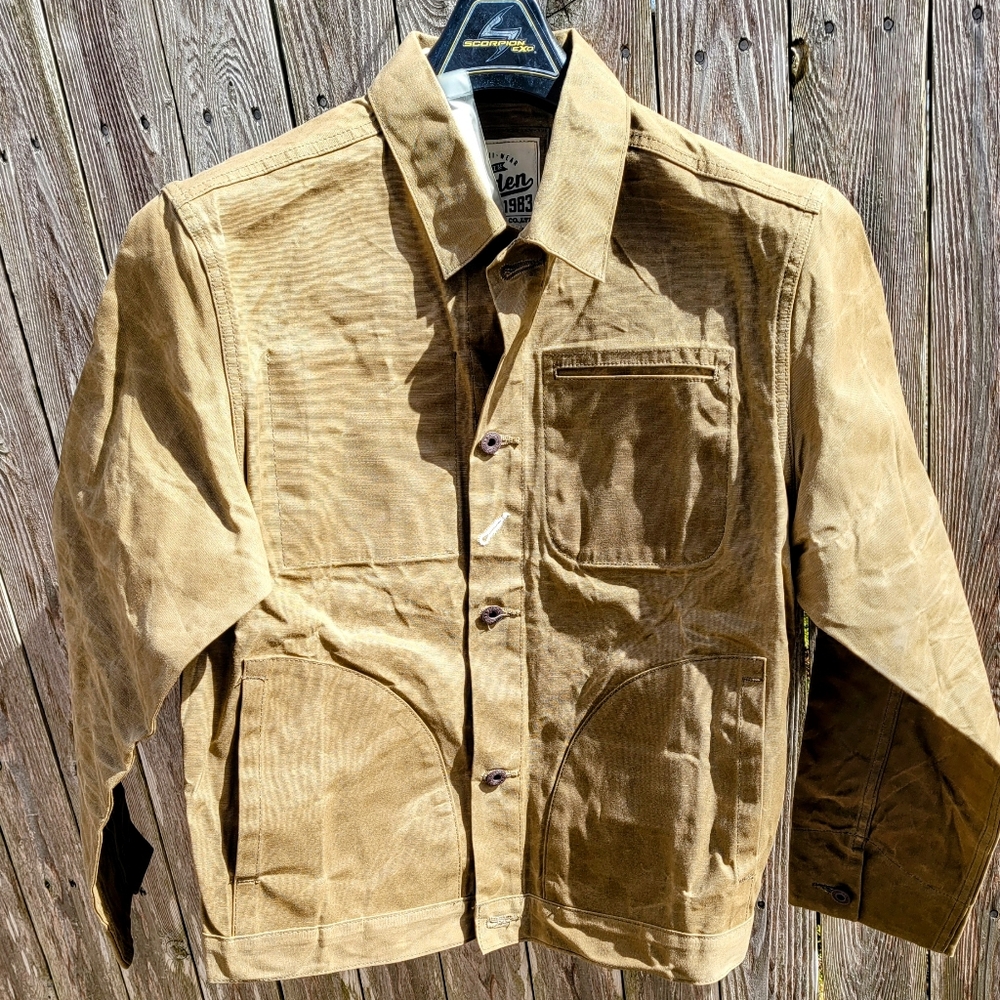 Bond style Waxed Jacket size marked is xl I would say it fits like a med/lg